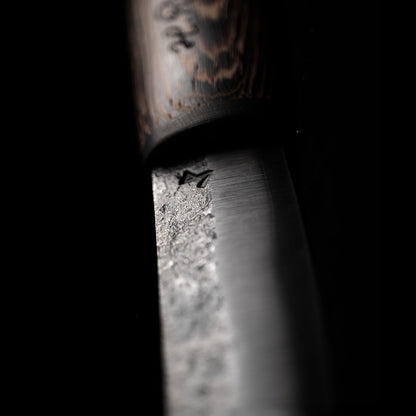 Roselli's limited edition knife "Carpenter knife black edition". Made from exclusive laminated carbon steel, wenge wood handle with carbon fiber ferrule. Comes with a handmade leather sheath in black. 