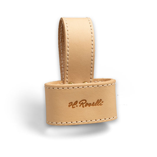 Roselli's Finnish handmade axe holster made out of our light vegetable leather.