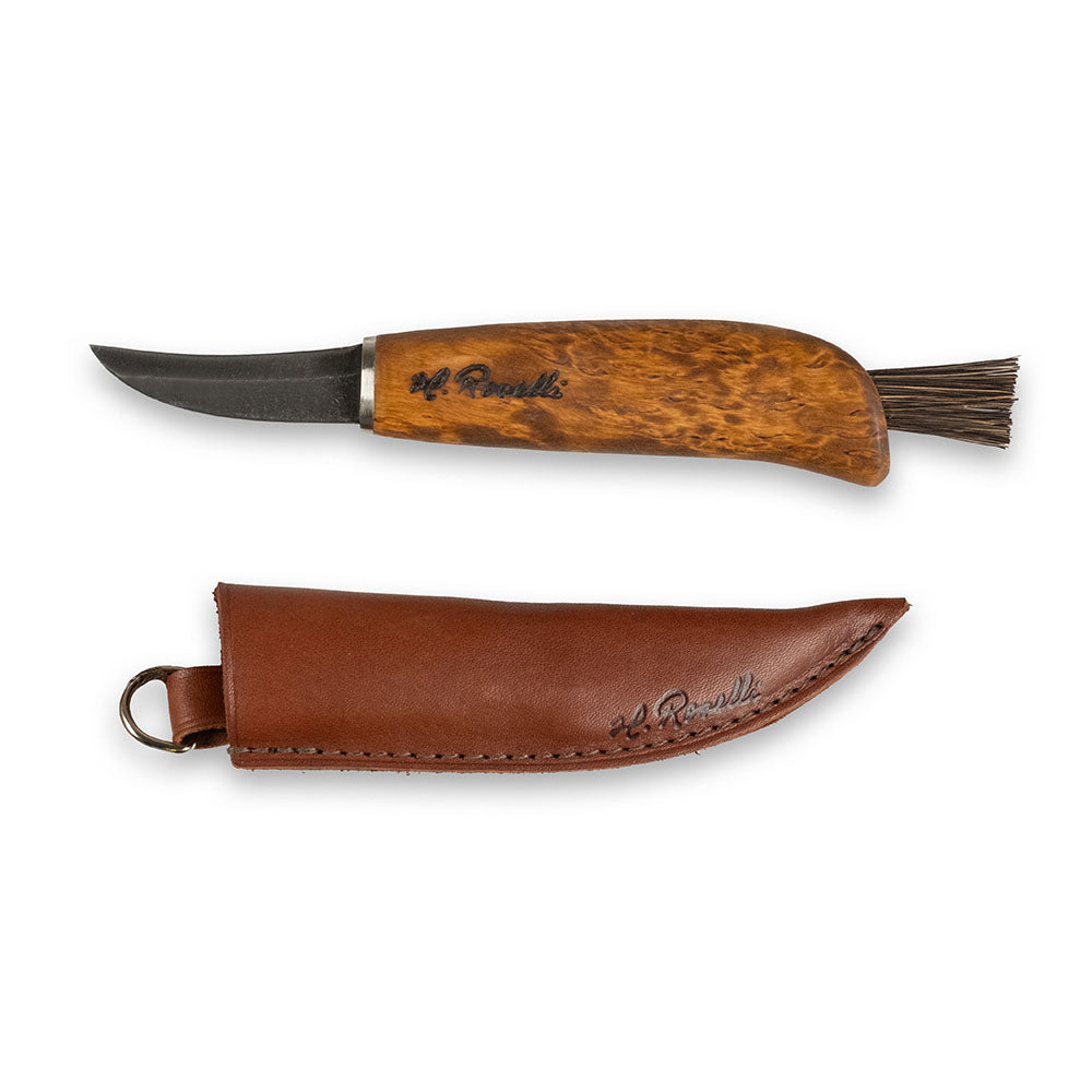 Finnish handmade mushroom knife made from carbon steel and curly birch. Comes with a handmade leather sheath and a mushroom brush made from arenga fiber